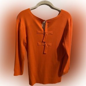 Amazing top with 3/4 sleeves and back buckle detail. Amazing color